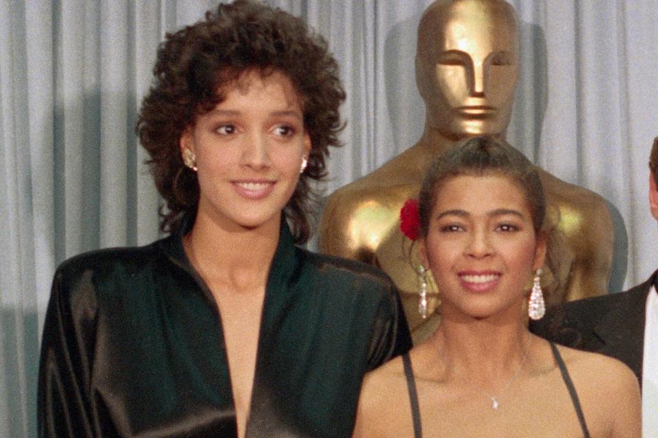 (Original Caption) Winner of the Academy Award for the Best Song in a Movie, the writers of "Flashdance... What a Feeling," pose with presenters after the ceremony. From left to right are: Actress Jennifer Beals, songwriter Irene Cara, songwriter Keith Forsey, and actor Mathew Broderick.