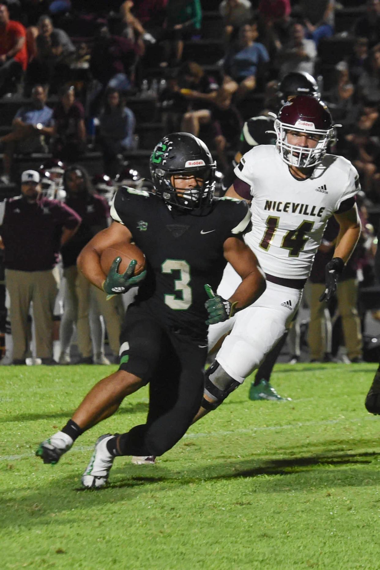 Choctawhatchee High School's Cole Tabb runs the ball against Niceville High School during a game on Friday, Sept. 23, 2022 at Etheredge Stadium.