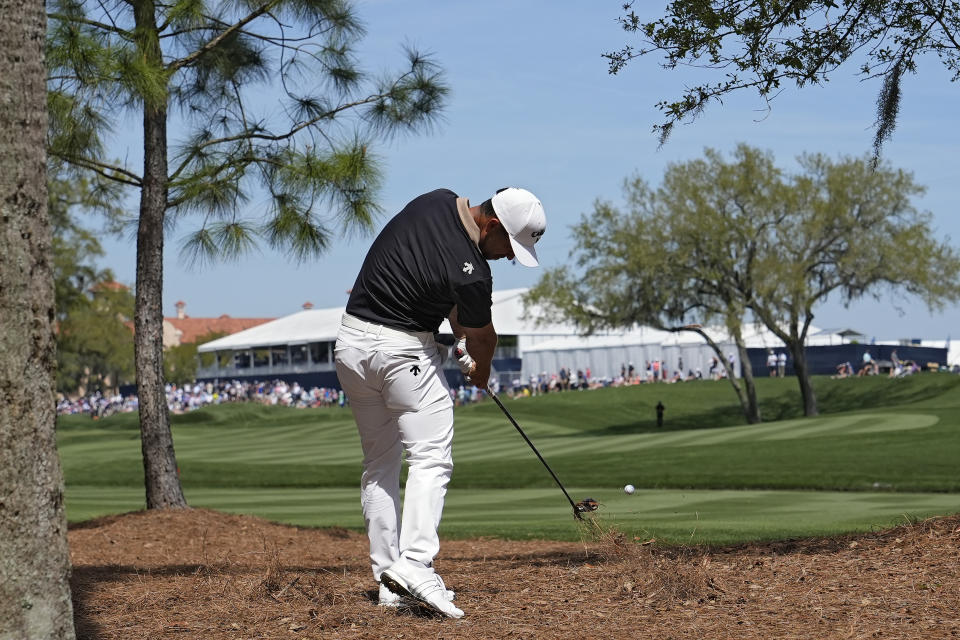 Xander Schauffele hits from off the ninth fairway during the first round of The Players Championship golf tournament Thursday, March 14, 2024, in Ponte Vedra Beach, Fla. (AP Photo/=01350806=)