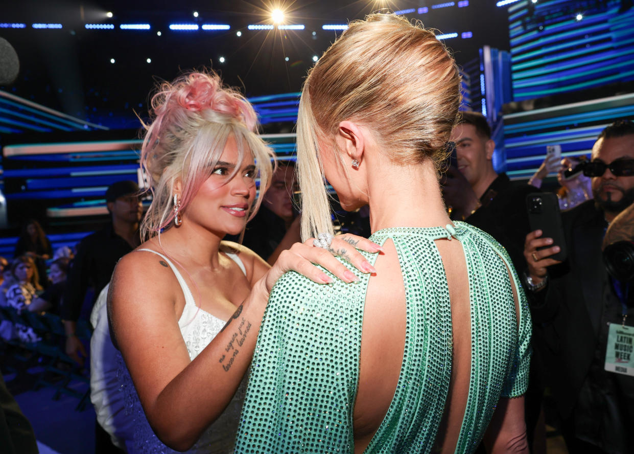 Karol G and Paris Hilton at the Billboard Latin Music Awards 2023 held at Watsco Center on October 5, 2023 in Coral Gables, Florida. (Photo by Christopher Polk/Billboard via Getty Images)