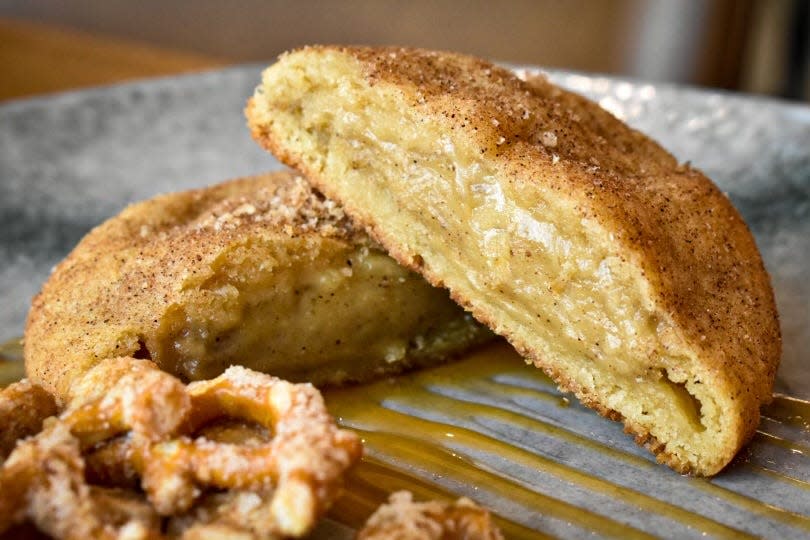 The dessert dinner's third course is all about horchata and peanut flavors: a vanilla cookie is stuffed with horchata-spiced peanut custard and served with a candied brittle.