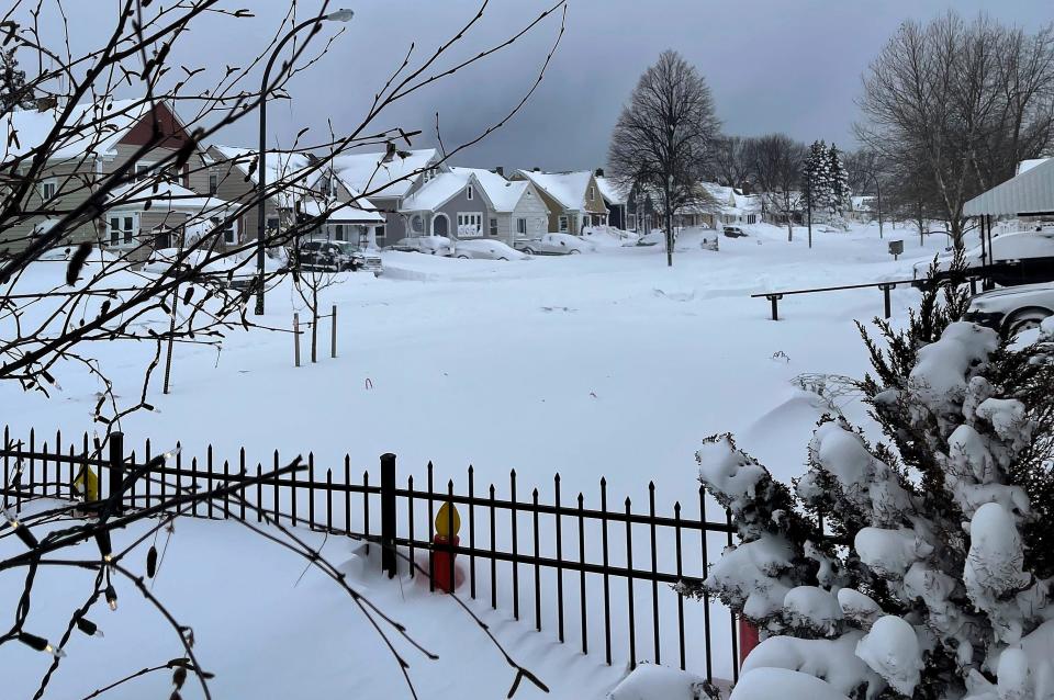 Snow blankets a neighborhood on Christmas Day in Buffalo, N.Y.