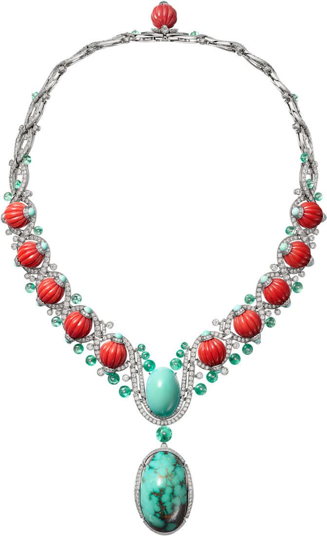 a necklace with beads and a red ball