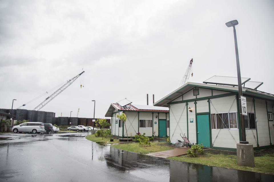 Located on the outskirts of Honolulu, the Kahauiki Village, is a permanent supportive housing community where 30 formerly homeless families live. Biluk and his family were hoping to be placed in one of the units here. But after months of waiting, they recently gave up and moved to Alaska, where housing is cheaper. (Photo: Marie Eriel Hobro)