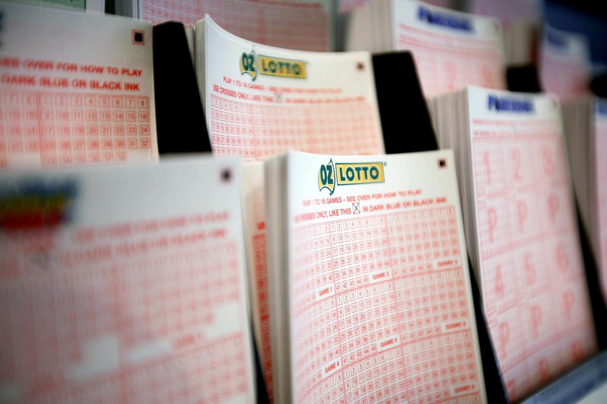 Lottery ticket forms are arranged for display at a New South Wales Lotteries Corp. retail outlet in Sydney, Australia, on Tuesday, March 2, 2010.