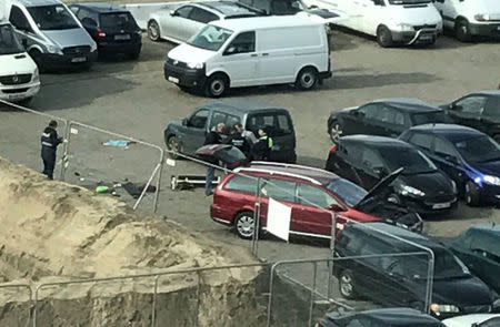 Police officers stand next to a car which had entered the main pedestrianised shopping street in the city at high speed, in Antwerp, Belgium, 23 March 2017. Anouk Frankly/Twitter Handout via REUTERSFOR EDITORIAL USE ONLY. NO RESALES. NO ARCHIVES THIS IMAGE HAS BEEN SUPPLIED BY A THIRD PARTY. IT IS DISTRIBUTED, EXACTLY AS RECEIVED BY REUTERS, AS A SERVICE TO CLIENTSFOR EDITORIAL USE ONLY. NOT FOR SALE FOR MARKETING OR ADVERTISING CAMPAIGNS