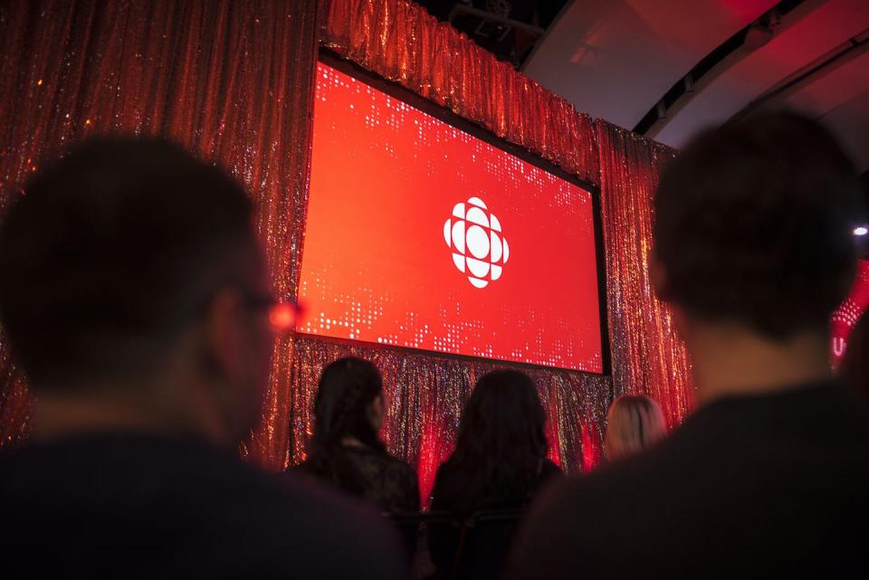 The CBC logo is projected onto a screen during the CBC’s annual upfront presentation in Toronto in 2019. THE CANADIAN PRESS/Tijana Martin