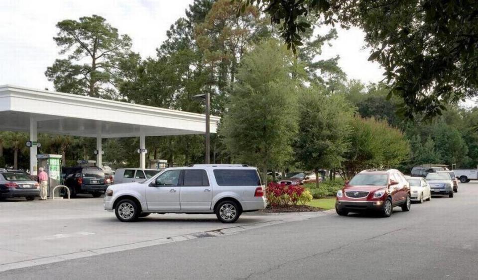 Cars wait in line to fill up as they back up onto U.S. 278 in greater Bluffton at the Parker’s Gas Station in the Home Depot shopping center on Tuesday. S.C. Gov Nikki Haley has called for an evacuation of coastal communities beginning Wednesday at 3 p.m. as Hurricane Matthew moves closer to South Carolina.