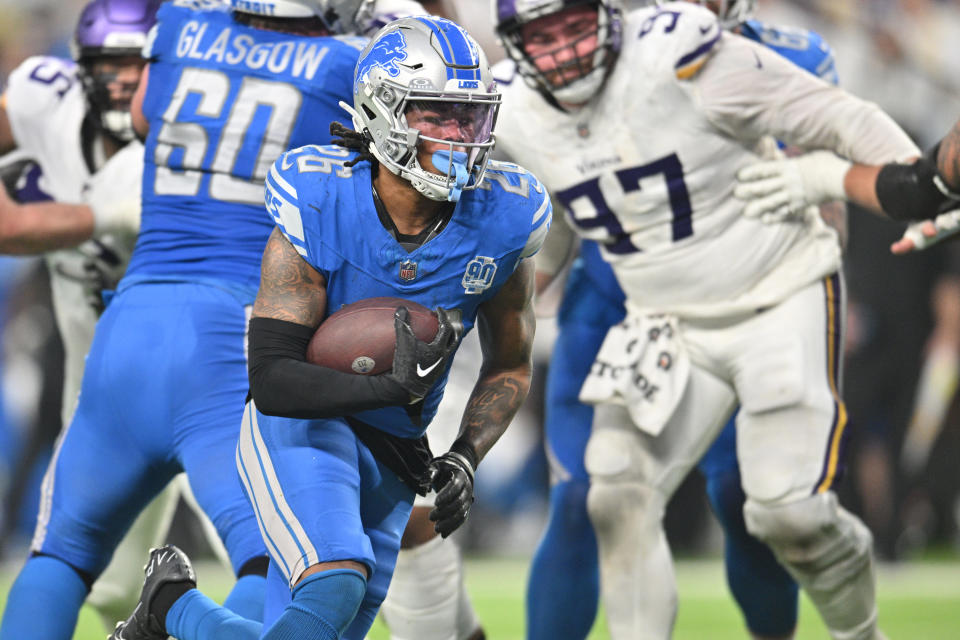 Dec 24, 2023; Minneapolis, Minnesota, USA; Detroit Lions running back <a class="link " href="https://sports.yahoo.com/nfl/players/40059" data-i13n="sec:content-canvas;subsec:anchor_text;elm:context_link" data-ylk="slk:Jahmyr Gibbs;sec:content-canvas;subsec:anchor_text;elm:context_link;itc:0">Jahmyr Gibbs</a> (26) runs for a touchdown during the third quarter against the Minnesota Vikings at U.S. Bank Stadium. Mandatory Credit: Jeffrey Becker-USA TODAY Sports