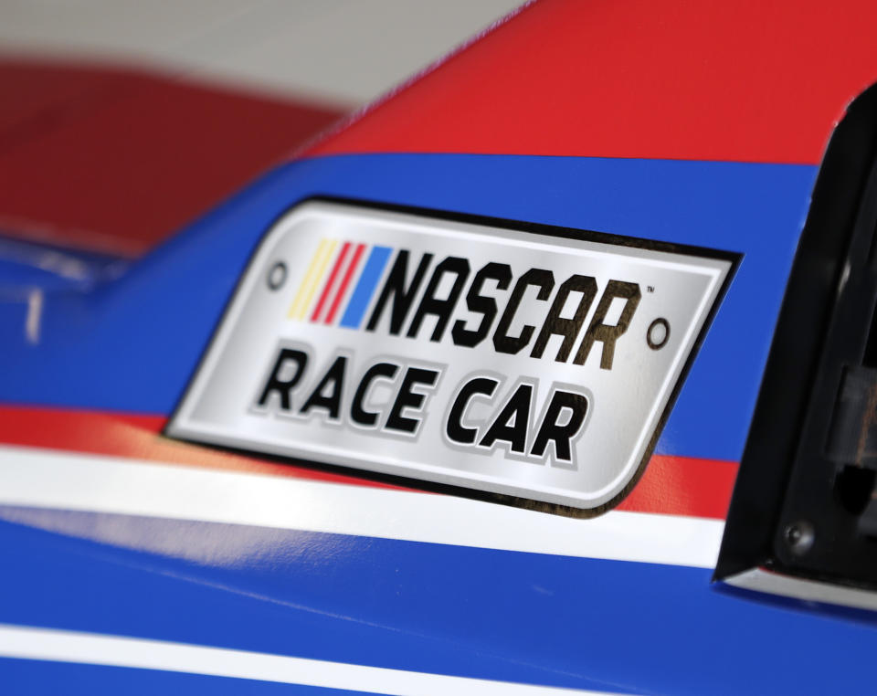 A NASCAR logo on a car is seen in the garage during a NASCAR auto racing practice session at Daytona International Speedway, Saturday, Feb. 10, 2018, in Daytona Beach, Fla. (AP)