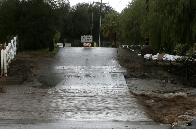 A road is blocked off due to floodwaters on January 23, 2017 in Santa Clarita, California