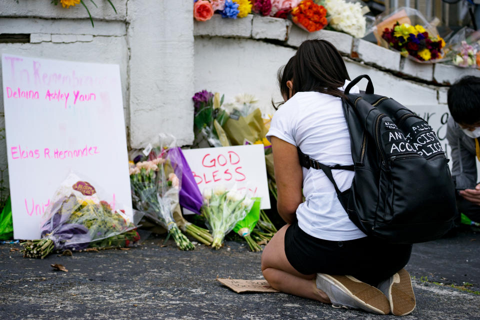 A person mourns at a memorial at Gold Spa in Atlanta (Megan Varner / Getty Images file)