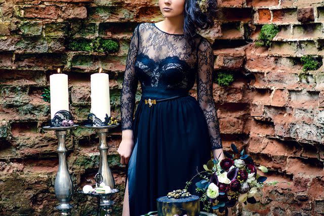 <p>Getty</p> A stock photo of a Gothic wedding look