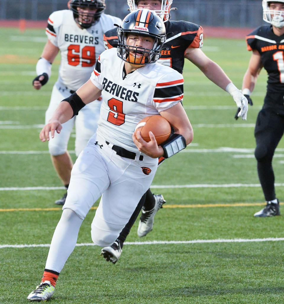 Corry High School junior Nolan Carey runs for a first-half touchdown against Harbor Creek in Harborcreek Township on Sept. 15, 2023.