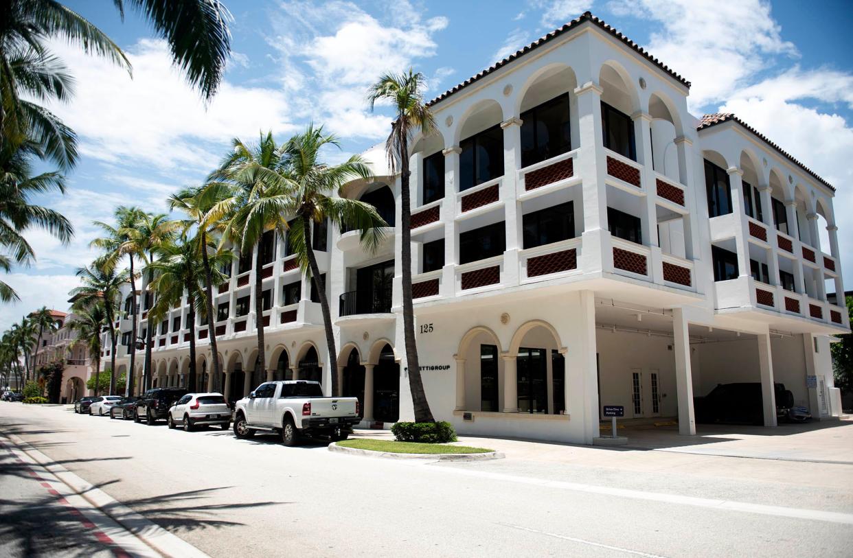 A company associated with billionaire Ken Griffin has paid a recorded $83 million for this retail-and-office building completed in 1974 at 125 Worth Ave.