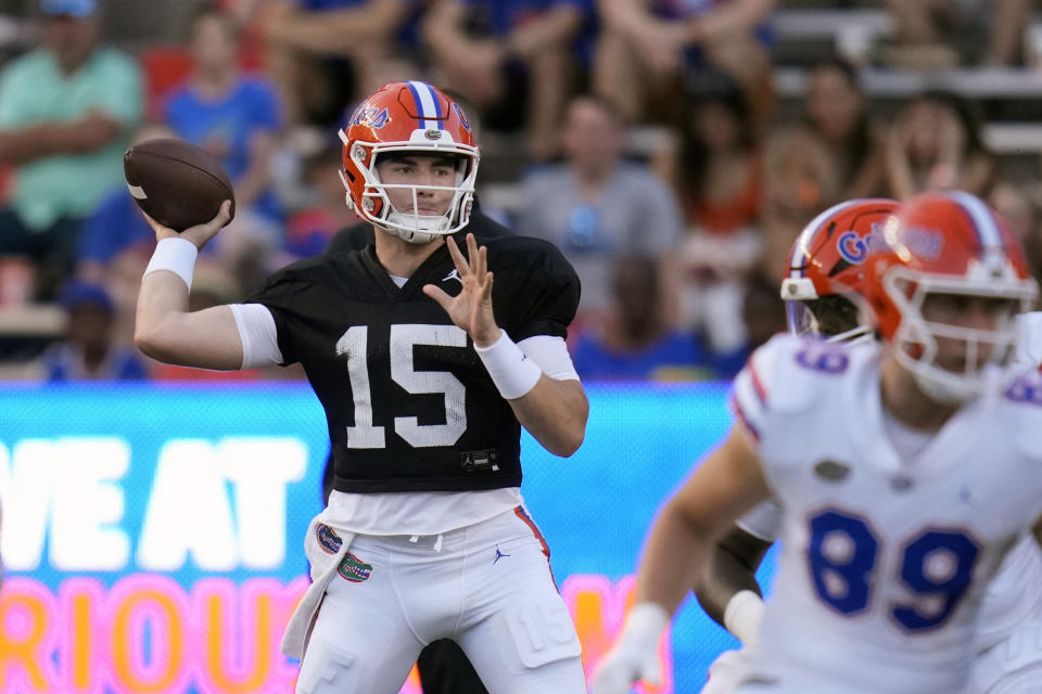 Florida quarterback Graham Mertz throws a pass during the NCAA college football team's annual Orange and Blue spring game Thursday, April 13, 2023, in Gainesville, Fla. (AP Photo/John Raoux)