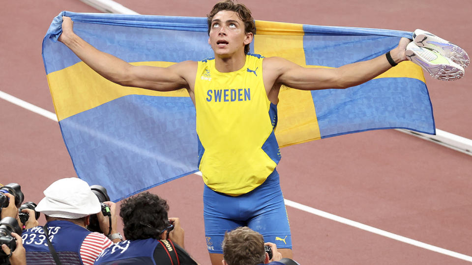 Armand Duplantis, pictured here after winning pole vault gold at the Olympics.