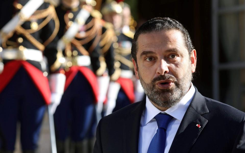 Lebanese Prime Minister Saad Hariri met the model on holiday - AFP