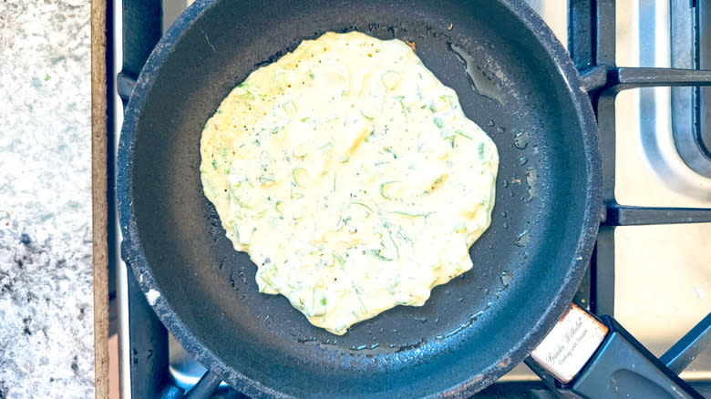 savory pancake batter in pan