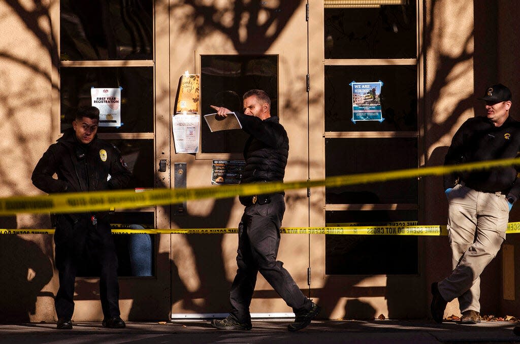 Law enforcement continue their investigation of a deadly overnight shooting at Coronado Hall on the campus of the University of New Mexico in Albuquerque, N.M., on Saturday, Nov. 19, 2022.