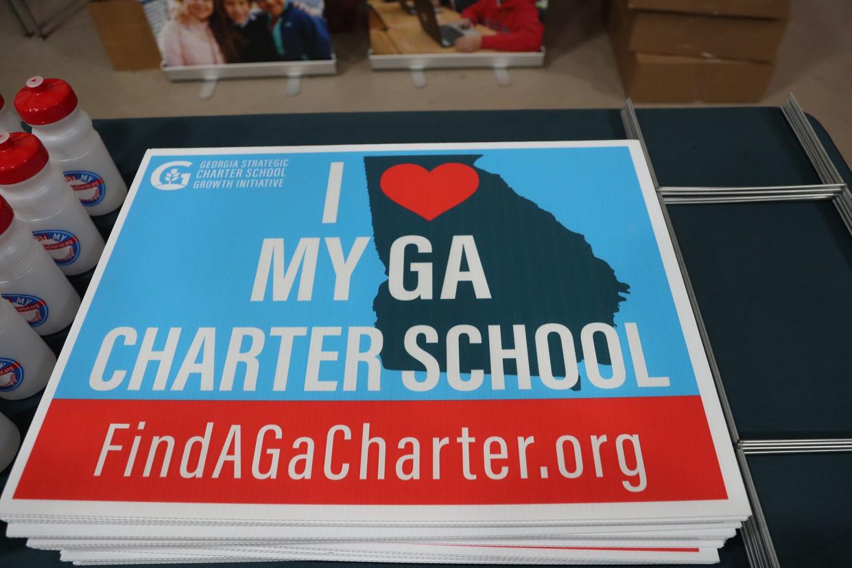 Yard signs showing support of Charter Schools were available during the 10th Anniversary celebration at Tybee Island Maritime Academy on Thursday, September 28, 2023.