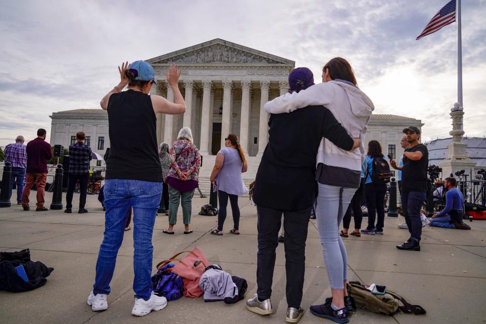 Anti-abortion advocates at the Supreme Court on Oct. 4, 2021.