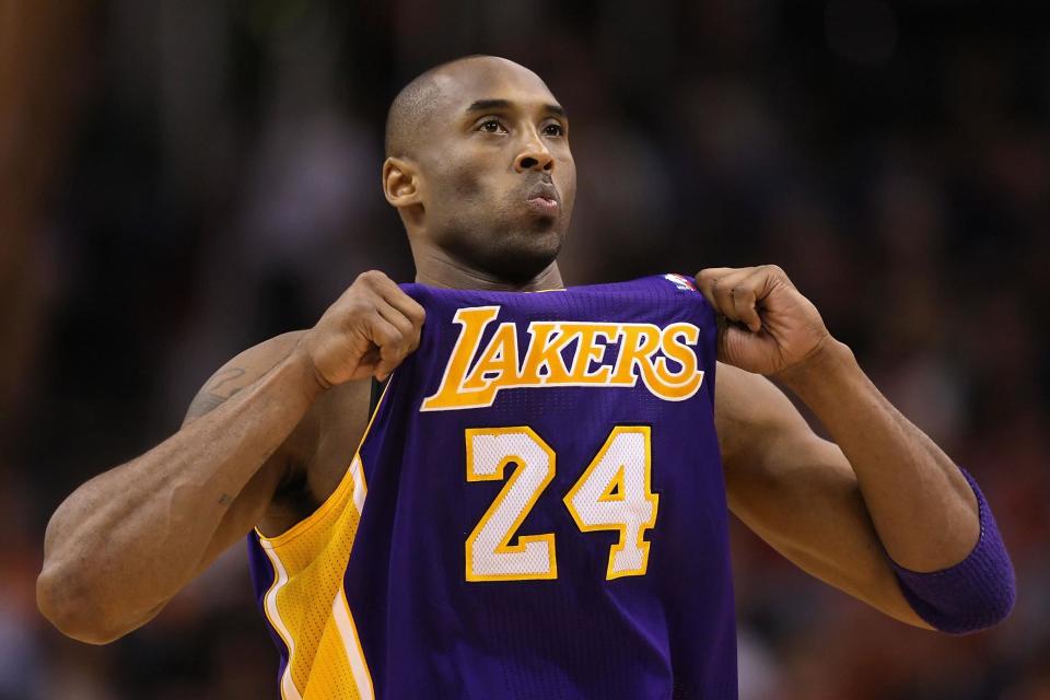 Kobe Bryant adjusts his jersey during an NBA game on 19 February 2012 in Phoenix, Arizona: Getty