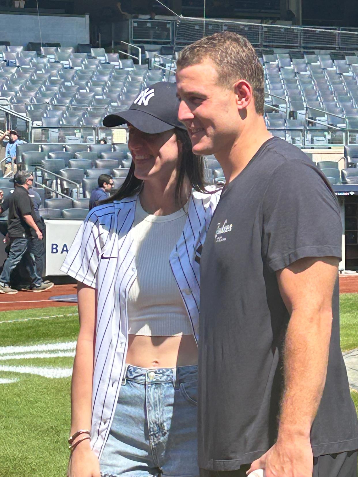 WNBA star Caitlin Clark with Yankees first baseman Anthony Rizzo on Saturday, Aug. 10, 2024 prior to the Yankees hosting the Texas Rangers for a matinee game at Yankee Stadium, New York.