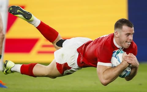 Wales' scrum-half Gareth Davies dives and scores a try during the Japan 2019 Rugby World Cup Pool D match between Australia and Wales at the Tokyo Stadium - Credit: Odd Anderson/Getty