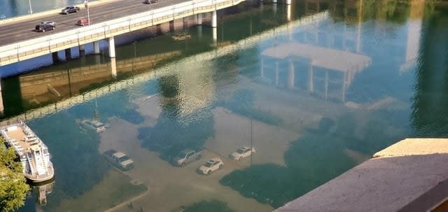 Cars and buildings that appear to be underwater