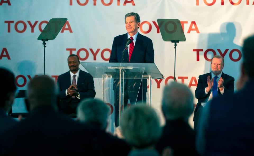 North Carolina Gov. Roy Cooper announces that the future use of the Greensboro-Randolph Megasite will be as a new Toyota battery manufacturing plant in Liberty, N.C., on Monday, Dec. 6, 2021. (Kenneth Ferriera/News & Record via AP)