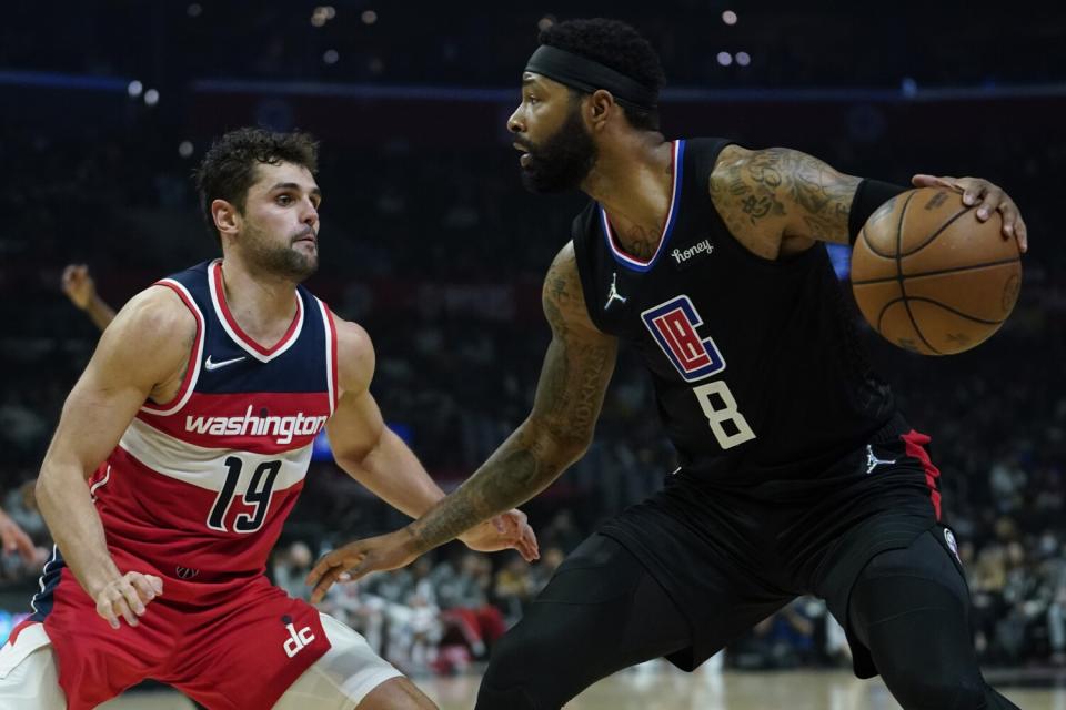 Washington Wizards guard Raul Neto defends against Los Angeles Clippers forward Marcus Morris Sr.