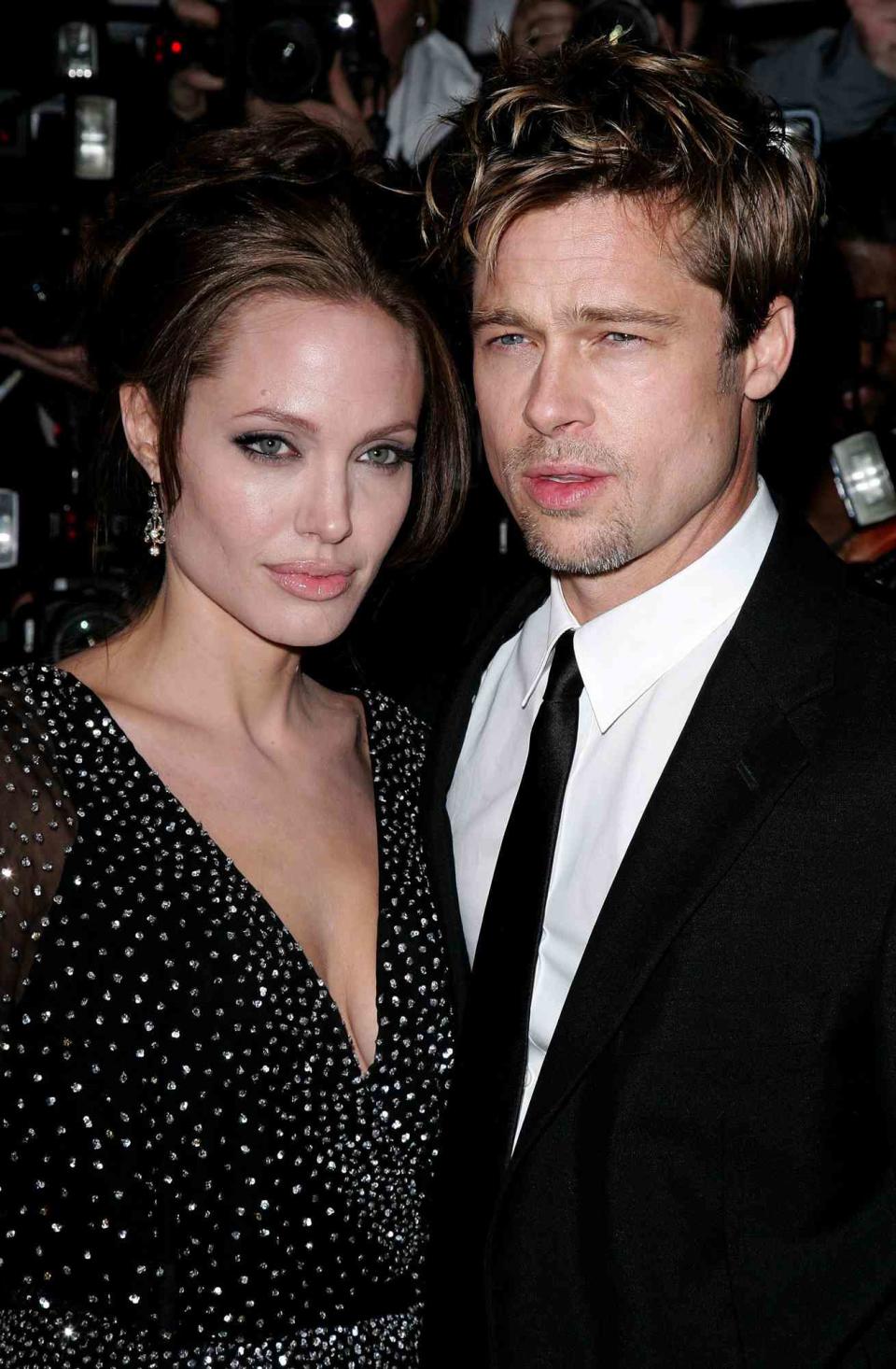 Angelina Jolie and Brad Pitt during "The Good Shepherd" - New York Premiere - Outside Arrivals at Ziegfeld Theater in New York City, New York, United States