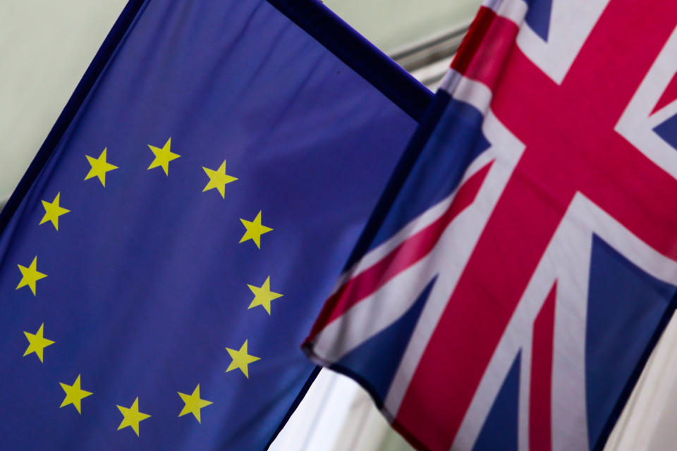 European Union and Great Britain flags are seen on the building in Krakow, Poland on January 5, 2020. (Photo by Jakub Porzycki/NurPhoto via Getty Images)