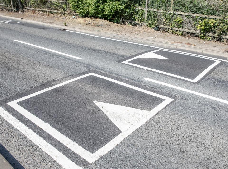 The mock humps were painted to slow down speeding drivers along a busy road that leads to two different schools. (SWNS)