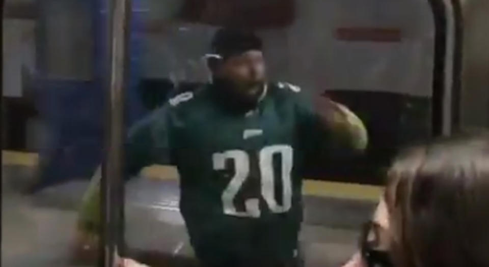 Watch this happy Eagles fan get leveled by a subway pole, (Screen shot)