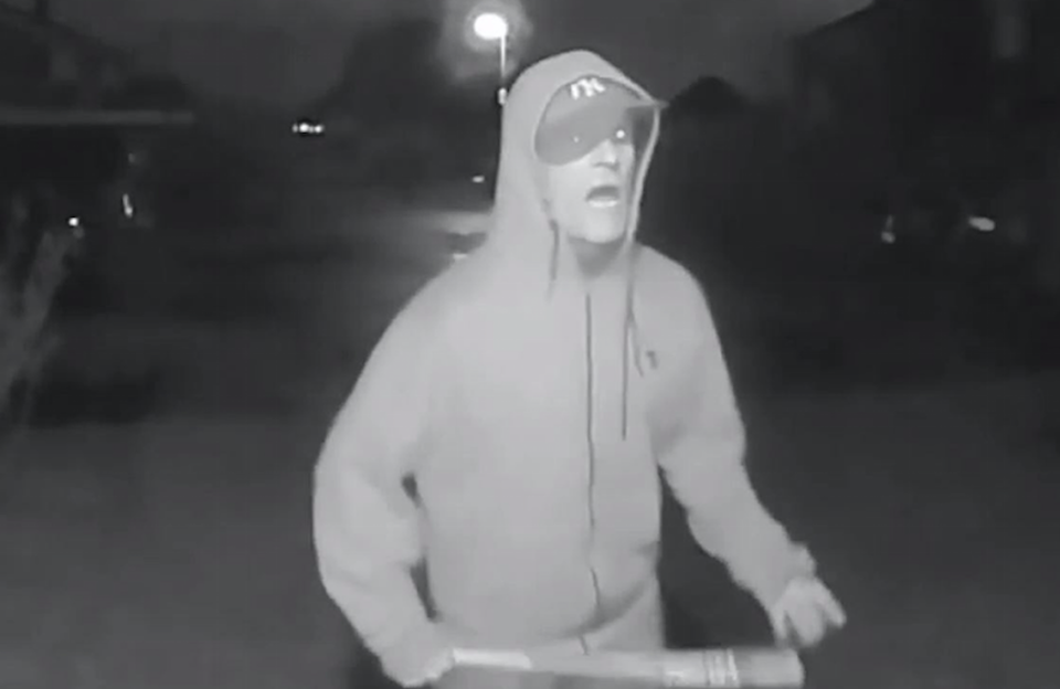 Vincent Fuller was caught on CCTV swinging a baseball bat outside a neighbour's house (Picture: PA)