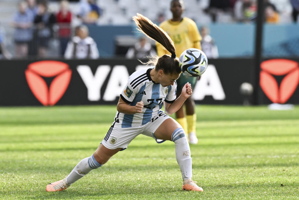 Argentina's Estefania Banini heads the ball during the Women's World Cup Group G soccer match between Argentina and South Africa in Dunedin, New Zealand, Friday, July 28, 2023. (AP Photo/Andrew Cornaga)