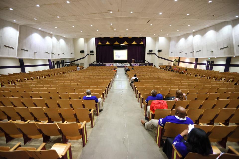 Empty seats fill the auditorium on Wednesday, Dec. 15, 2021 at Trezevant High School during a community meeting for parents whose children go to schools that, after a 10-year state takeover, are returning to the local district.