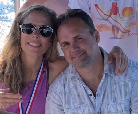 Handout photo of Patricia Beitzinger and Neal Baltz posing during a dive boat trip in Palau