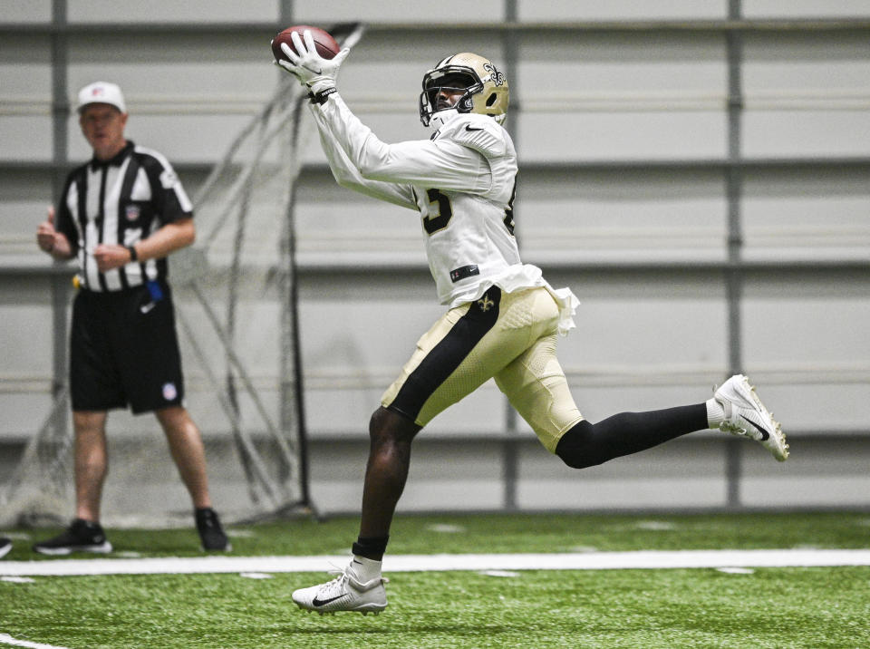 New Orleans Saints wide receiver Juwan Johnson makes a catch during an NFL football training camp practice in New Orleans, Saturday, Aug. 21, 2021. (Max Becherer/The Advocate via AP)