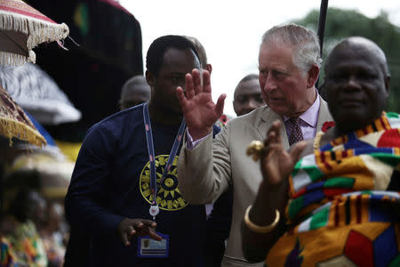 FILE PHOTO: Britain's Prince Charles waves as he arrives to visit the Manhyia Palace of the Ashanti Kingdom and meet with the Ashanti king Otumfuo Osei Tutu II in Kumasi, Ghana November 4, 2018. REUTERS/Francis Kokoroko/File Photo