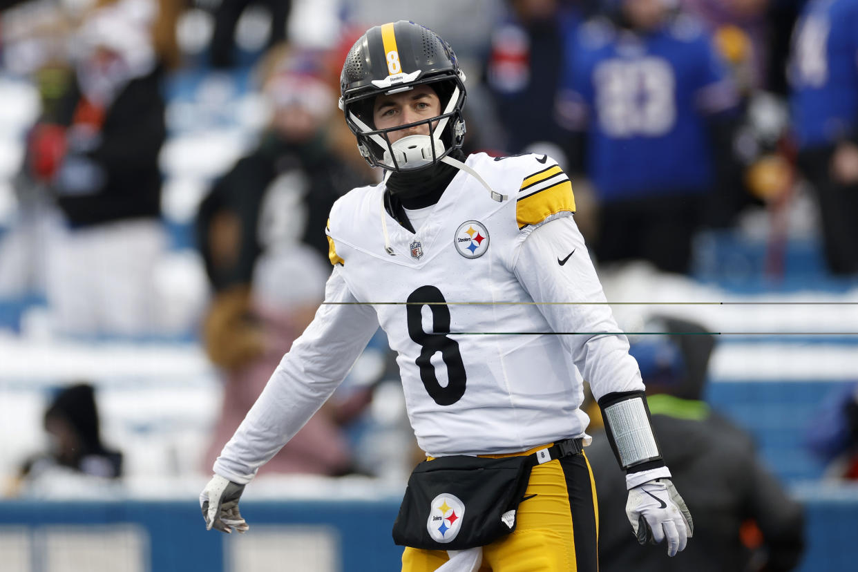 ORCHARD PARK, NEW YORK - JANUARY 15: Kenny Pickett #8 of the Pittsburgh Steelers warms up before the game against the Buffalo Bills at Highmark Stadium on January 15, 2024 in Orchard Park, New York. (Photo by Sarah Stier/Getty Images)