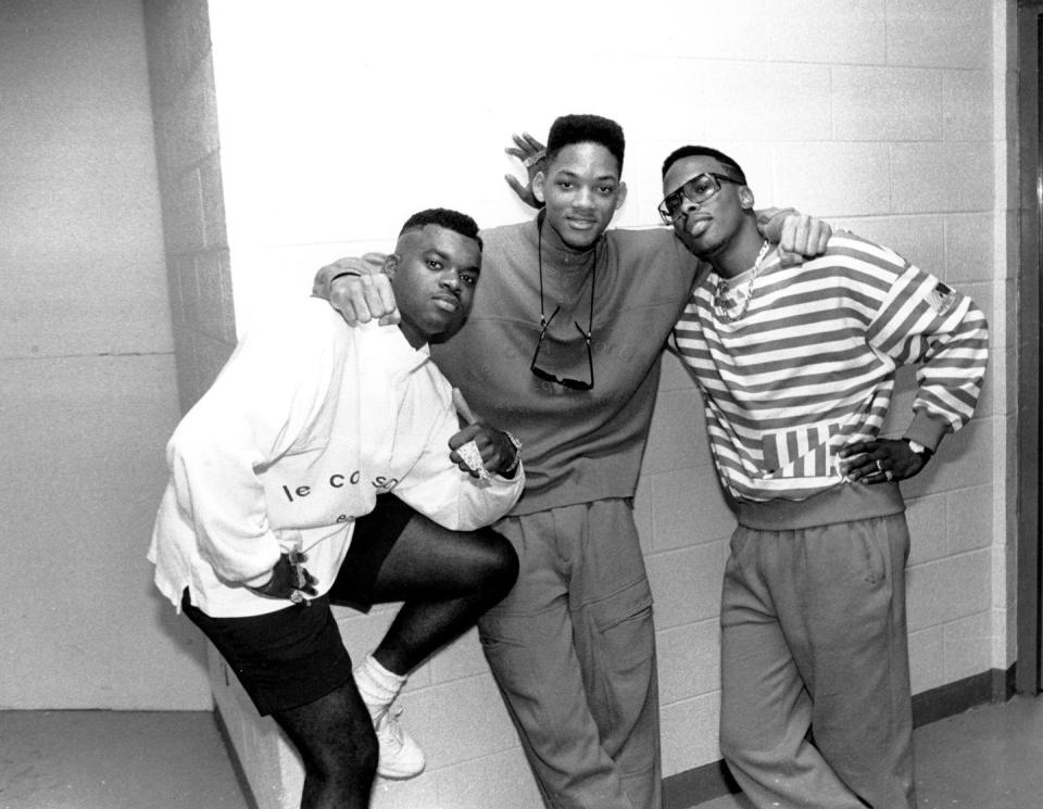 <p>Will Smith is photographed backstage after a live concert in Chicago, Illinois with his rap partner, DJ Jazzy Jeff, and one of their dancers, Ready Rock C. This is before the rapper moved to Bel-Air and becoming a '90s sitcom star. </p>