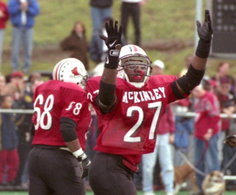 McKinley's Mike Doss looks to fire up the crowd at Fawcett Stadium during his team's win over Massillon, Nov. 1, 1997 to complete a 10-0 regular season.