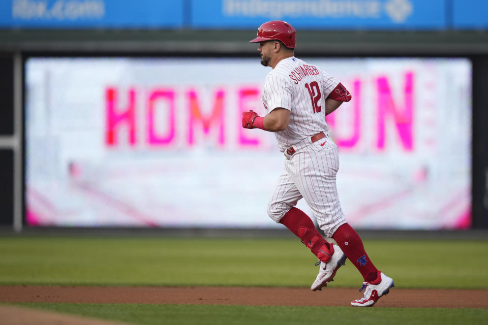 Philadelphia Phillies' Kyle Schwarber rounds the bases after hitting a home run against Milwaukee Brewers pitcher Julio Teheran during the first inning of a baseball game, Tuesday, July 18, 2023, in Philadelphia. (AP Photo/Matt Slocum)