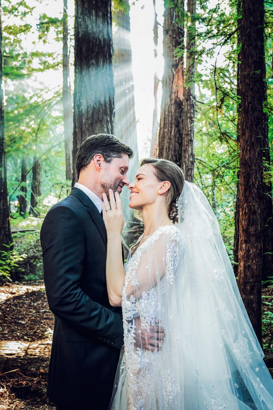 The actress and producer married the man of her dreams beneath a family of 800-year-old trees. Afterwards, the newlyweds surprised their guests with a Fred Astaire and Ginger Rogers–style tap routine and ended the night riding back to their rooms on bicycles decorated Burning Man–style with LED lights.