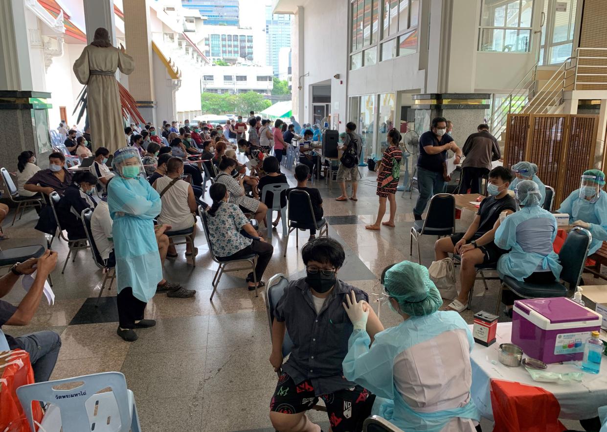 Medical personnel conducts COVID-19 vaccinations for people, offering the Sinovac and AstraZeneca vaccine shots, at the Holy Redeemer Catholic church compound in Bangkok, Thailand on May 9, 2021.