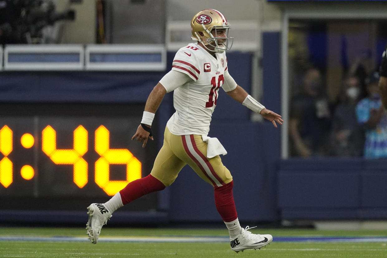 San Francisco 49ers quarterback Jimmy Garoppolo (10) helped rally his team to aa win that clinched a playoff spot. (AP Photo/Mark J. Terrill)