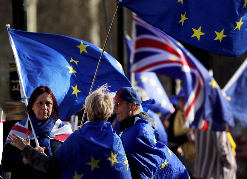 Brexit protesters demonstrate near the House of Parliament in London, Tuesday, March 26, 2019. British Prime Minister Theresa May's government says Parliament's decision to take control of the stalled process of leaving the European Union underscores the need for lawmakers to approve her twice-defeated deal. (AP Photo/Frank Augstein)